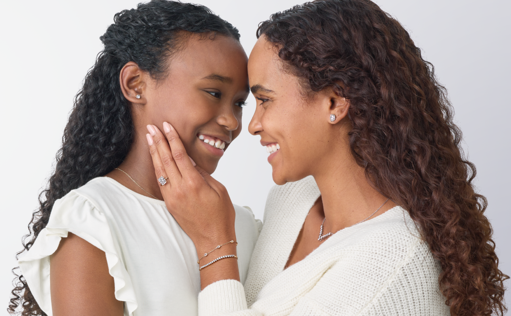 Mother and daughter together wearing lab grown diamond jewelry from MiaDonna