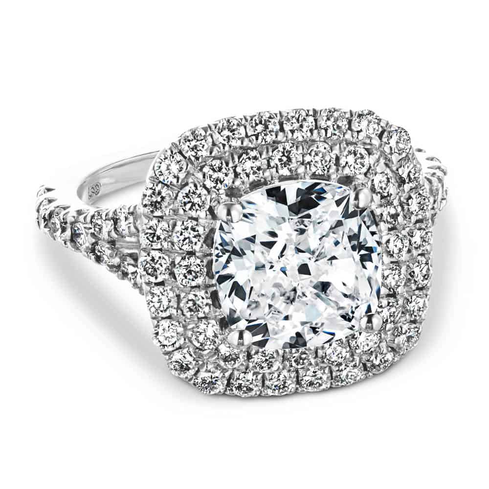 Shown with 1ct Cushion Cut Lab Grown Diamond in 14k White Gold|Luxurious double halo split shank engagement ring with diamond accents surrounding a 1ct cushion cut lab grown diamond in 14k white gold