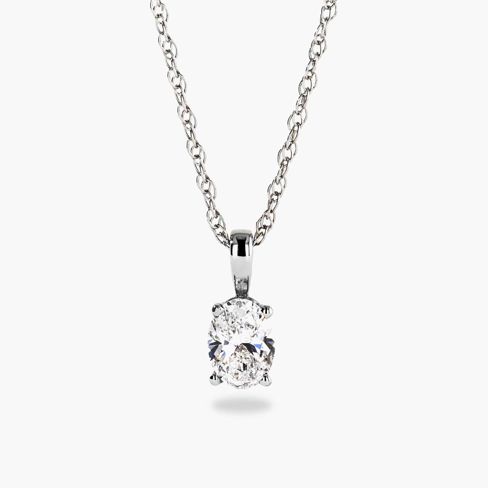Shown in 14K White Gold|basket pendant with an oval cut lab grown diamond by MiaDonna