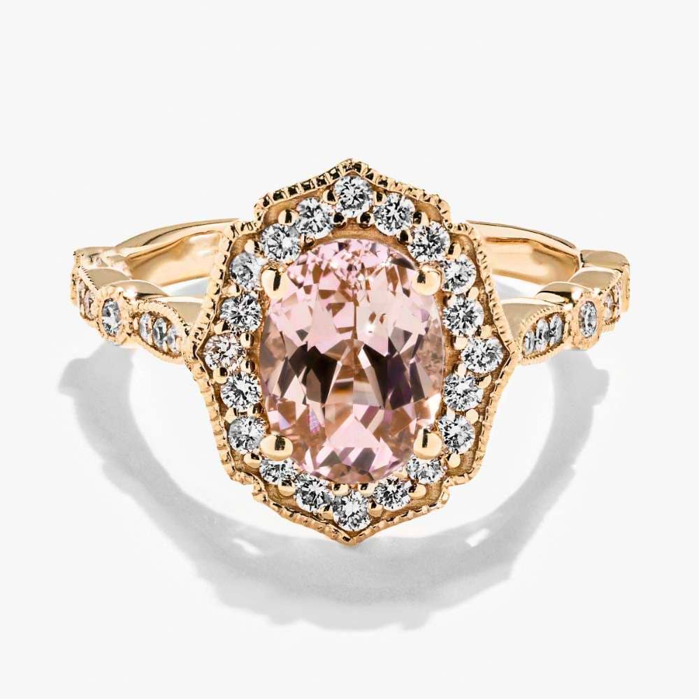 Shown here in 14K Yellow Gold with an Oval Cut Pink Champagne Sapphire