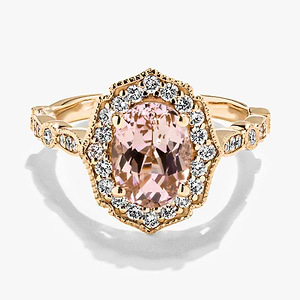 vintage diamond halo engagement ring featuring lab grown diamond accents and a pink champagne sapphire center stone