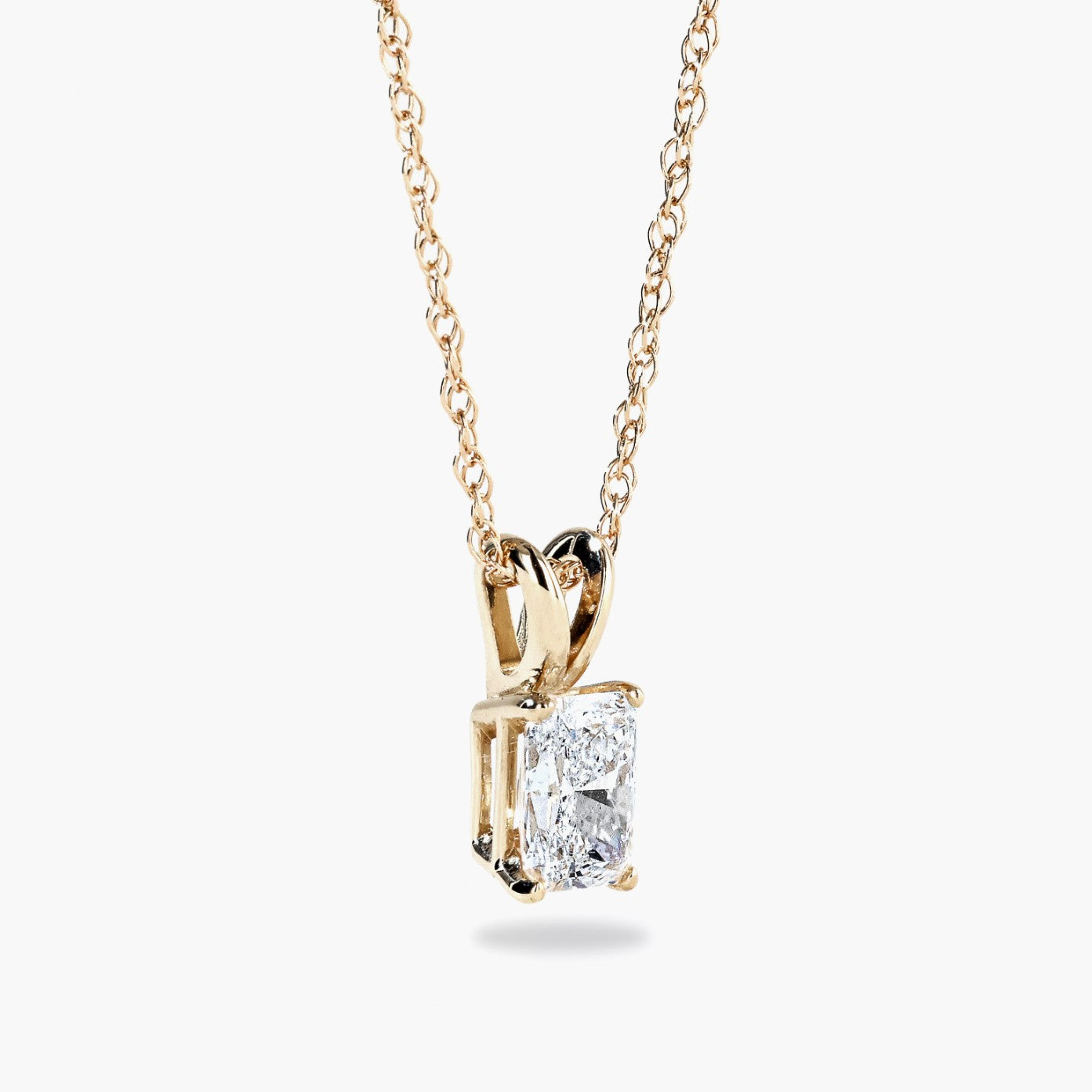 Shown in 14K Yellow Gold|radiant cut pendant featuring a lab grown diamond set in yellow gold by MiaDonna