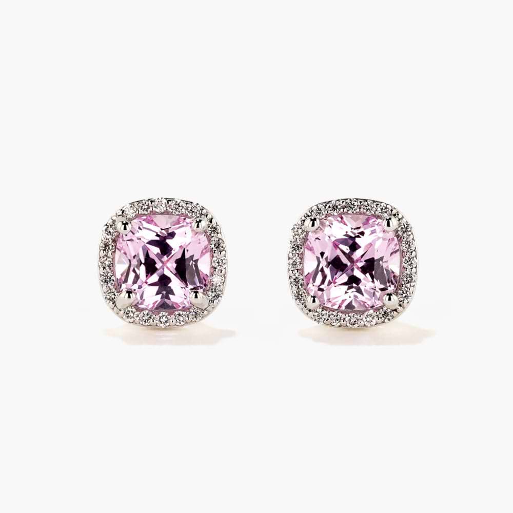 Shown in 14K White Gold|lab grown diamond halo stud earrings with pink champagne sapphire gemstones set in 14k white gold recycled metal