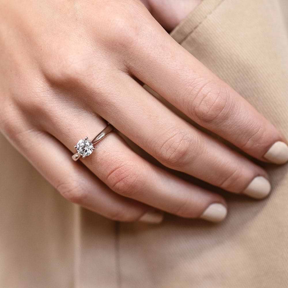 Shown In 14K White Gold With A Round Cut Center Stone|solitaire cathedral style ring set with a round cut lab grown diamond center stone