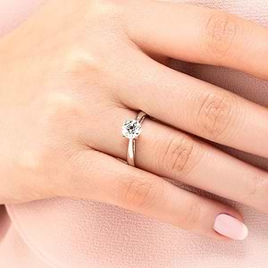 classic solitaire diamond ring with a round cut lab grown diamond center stone