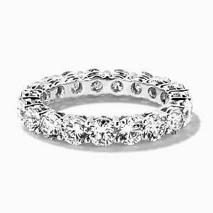 round cut lab grown diamond eternity band set in recycled white gold metal by MiaDonna