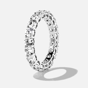 round cut lab grown diamond eternity band set in recycled white gold metal by MiaDonna