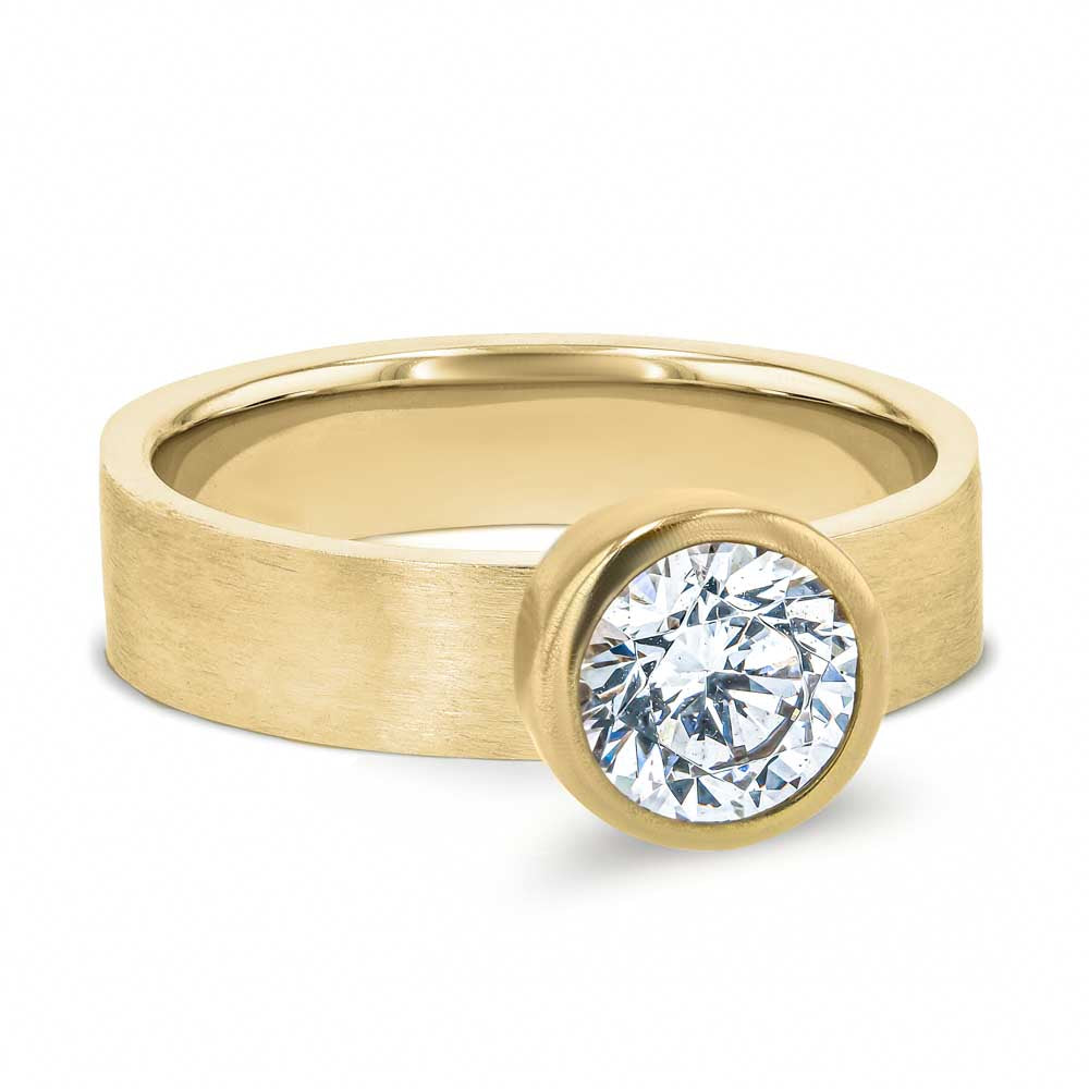 Shown in 14K Yellow Gold with a Satin Finish|bezel set solitaire engagement ring with satin finish in 14k yellow gold metal