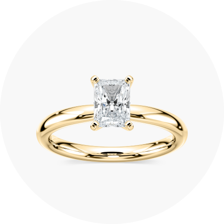 Solitaire engagement rings featuring a single diamond set in a simple band