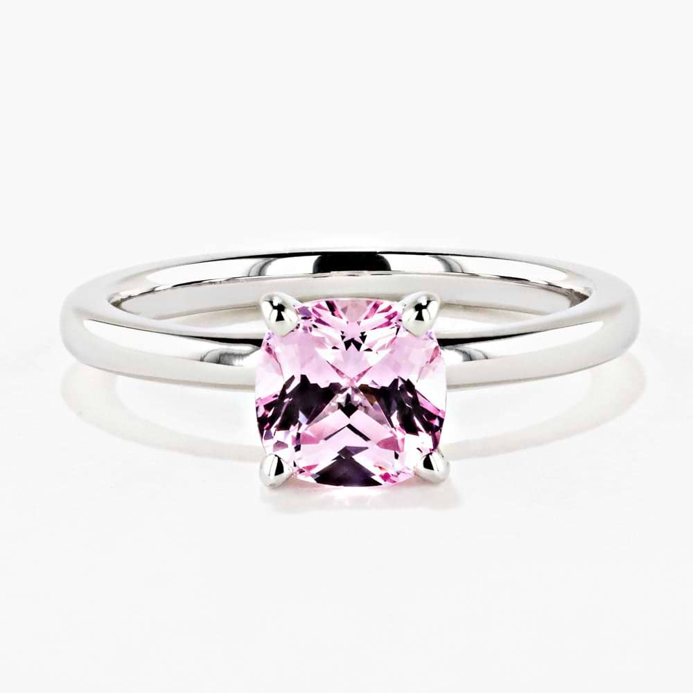 Shown in 14K White Gold|traditional solitaire engagement ring with a cushion cut lab grown pink champagne sapphire gemstone center stone set in 14k white gold recycled metal