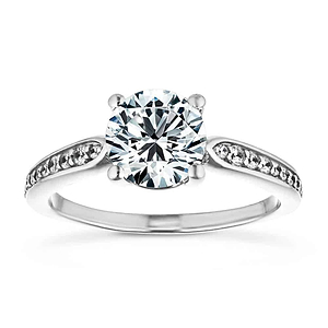  engagement ring Shown with a 1.0ct Round cut Lab-Grown Diamond with accenting diamonds on the band in recycled 14K white gold