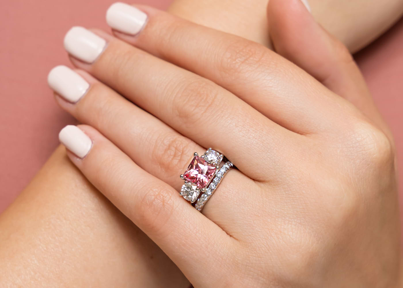Custom Wedding Set with a Princess Cut Pink Sapphire Lab Grown Gemstone and two sides stones in Round Cut.