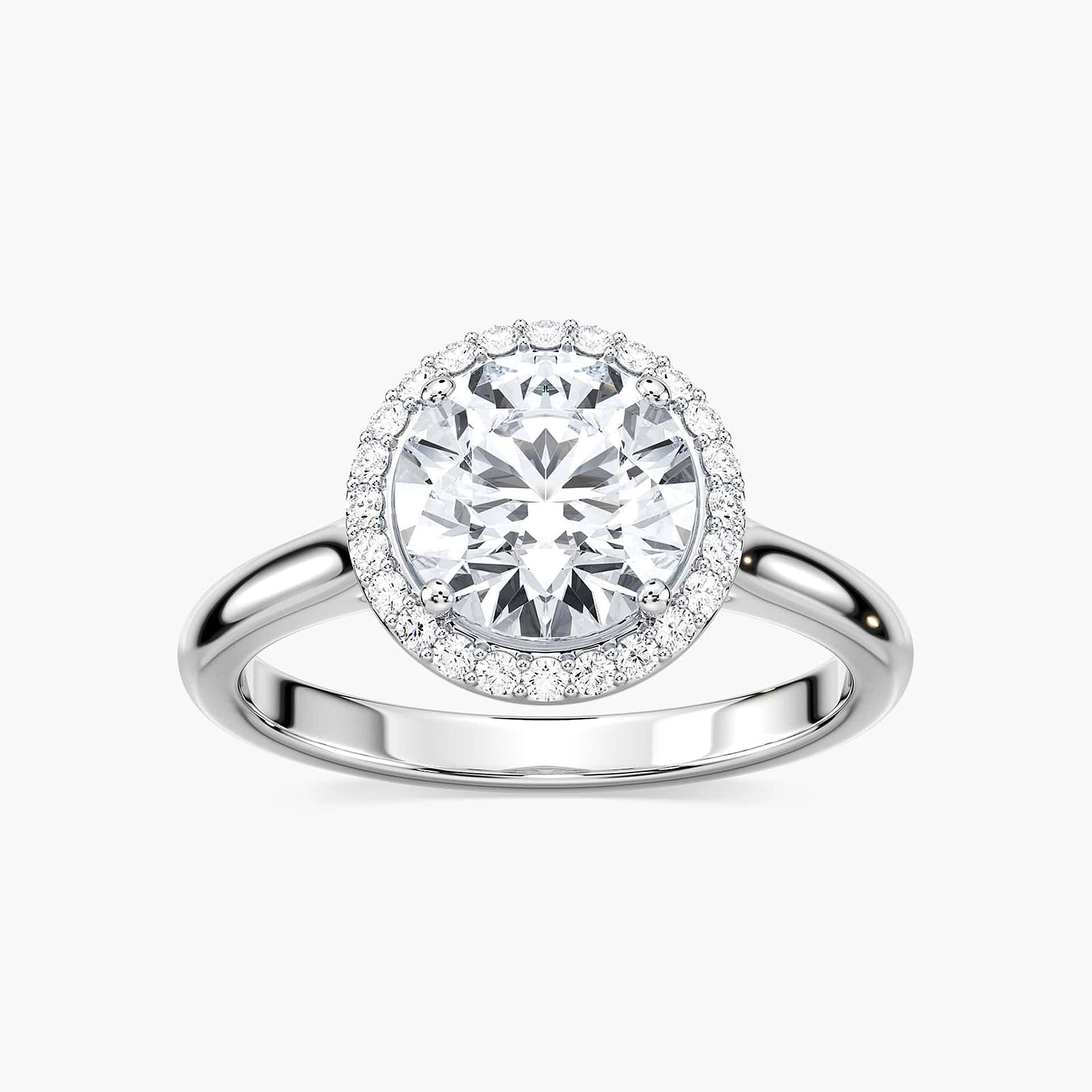 Shown with 1ct Round Cut Lab Grown Diamond in 14k White Gold|Beautiful stackable engagement ring with a diamond halo surrounding a 1ct round cut lab grown diamond in 14k white gold