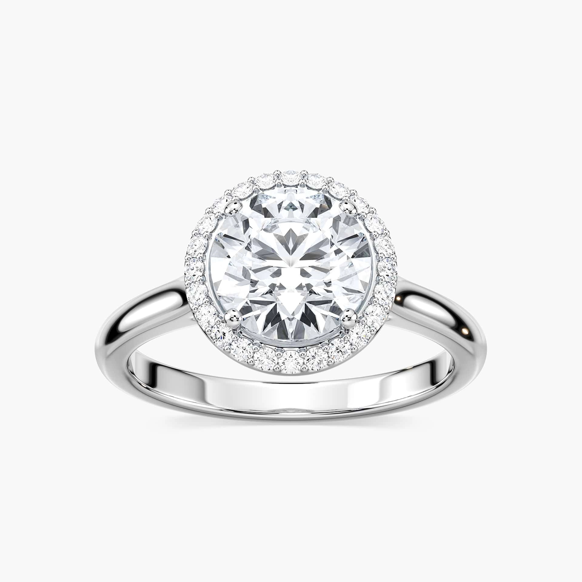Shown with 1ct Round Cut Lab Grown Diamond in 14k White Gold|Beautiful stackable engagement ring with a diamond halo surrounding a 1ct round cut lab grown diamond in 14k white gold