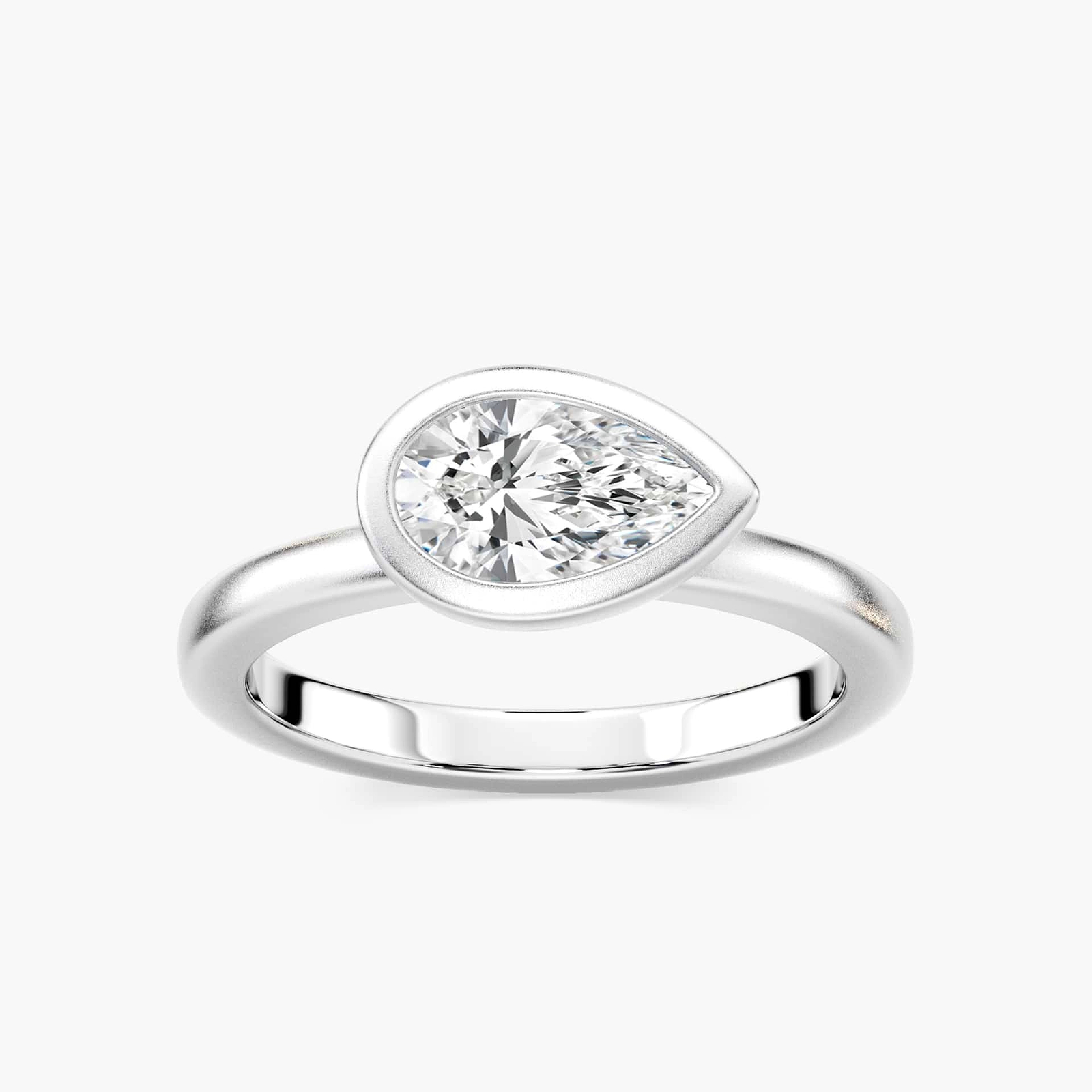 Shown in 14K White Gold with a Satin Finish|bezel set satin finish engagement ring with pear cut east to west lab grown diamonds