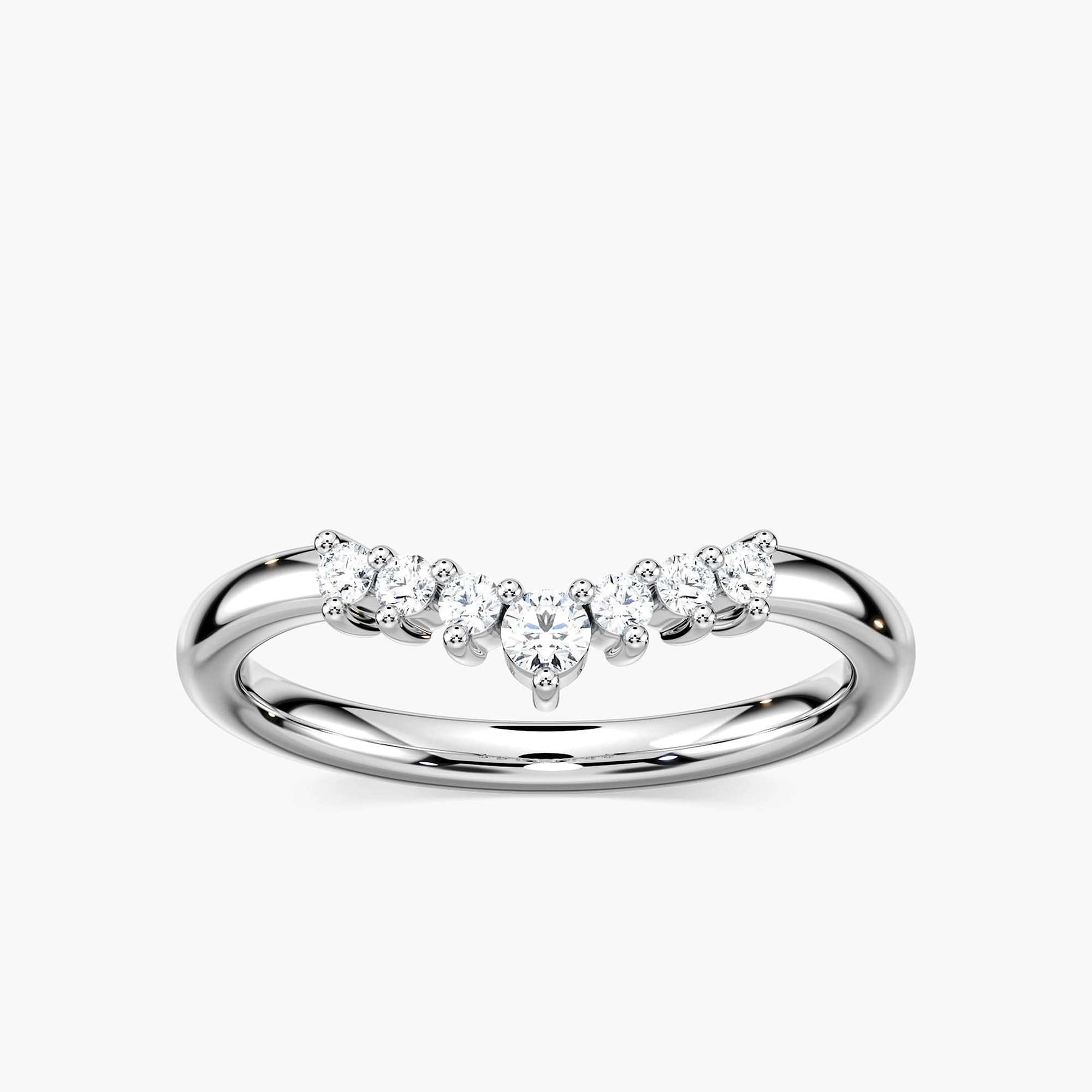 The Cordelia Wedding Band has a .21ctw half halo of round cut recycled diamonds that get larger in size as they meet in the middle of the recycled 14K white gold band | Cordelia wedding band recycled diamonds 14K white gold