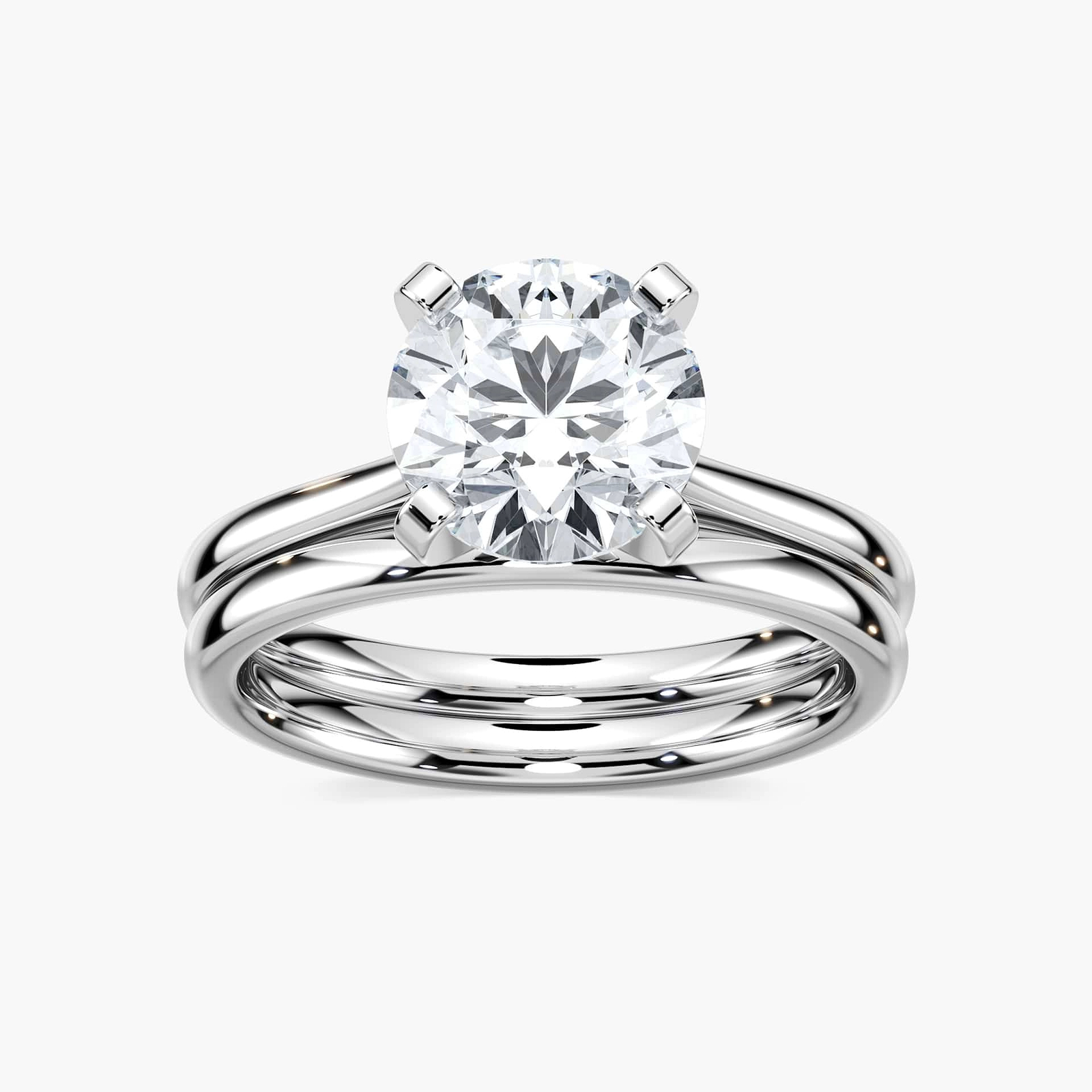 Shown with a 1.0ct Round cut Lab-Grown Diamond in recycled 14K white gold with matching wedding band | wedding set with 1.0ct round cut lab-grown diamond with recycled 14k white gold