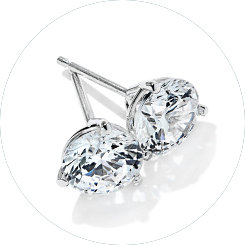 Image of a pair of white gold martini earrings featuring sparkling 1 carat lab-created diamonds.