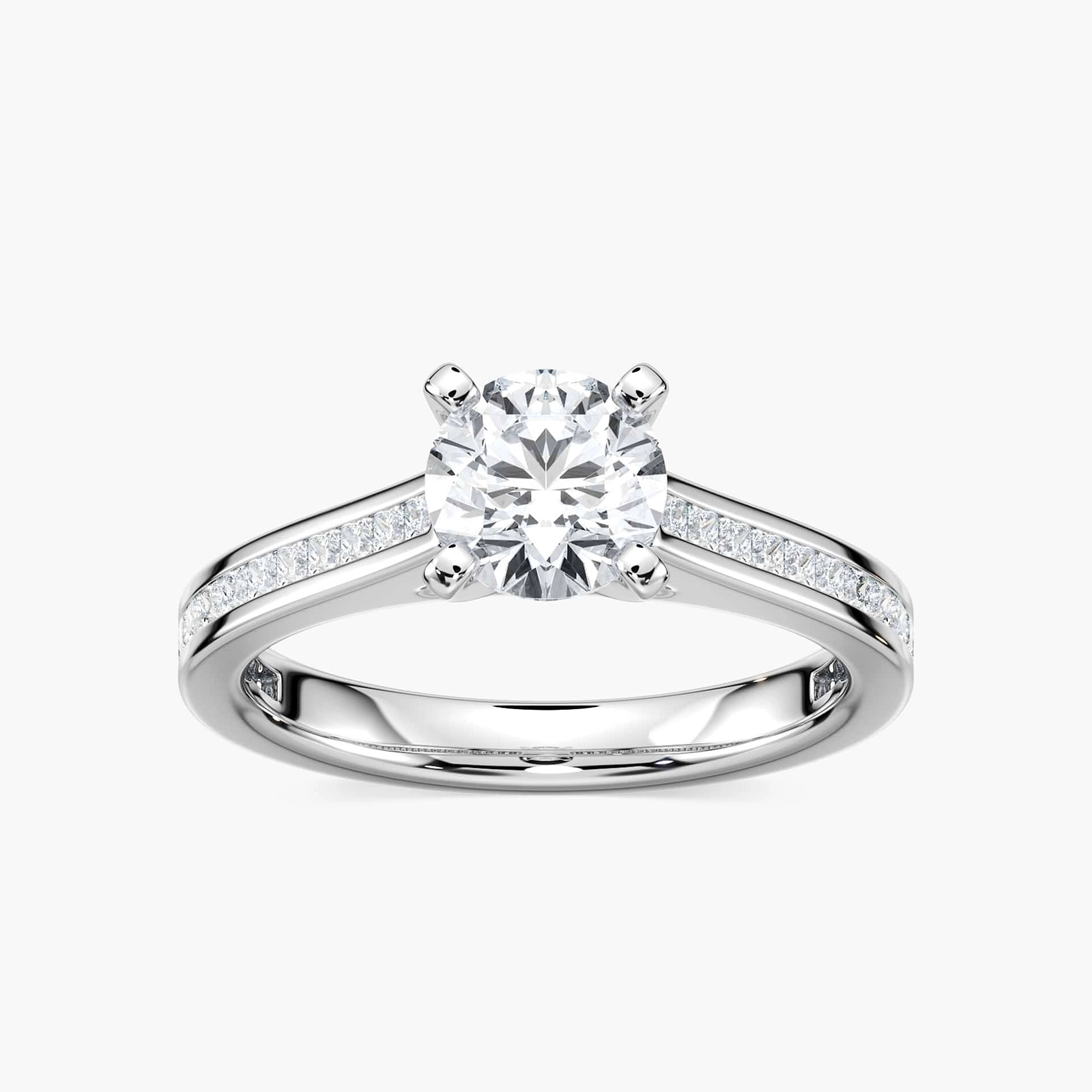 Shown with 1ct Round Cut Lab Grown Diamond in Platinum|Modern style diamond accented engagement ring with 1ct round cut lab grown diamond and channel set princess cut accenting side stones in platinum