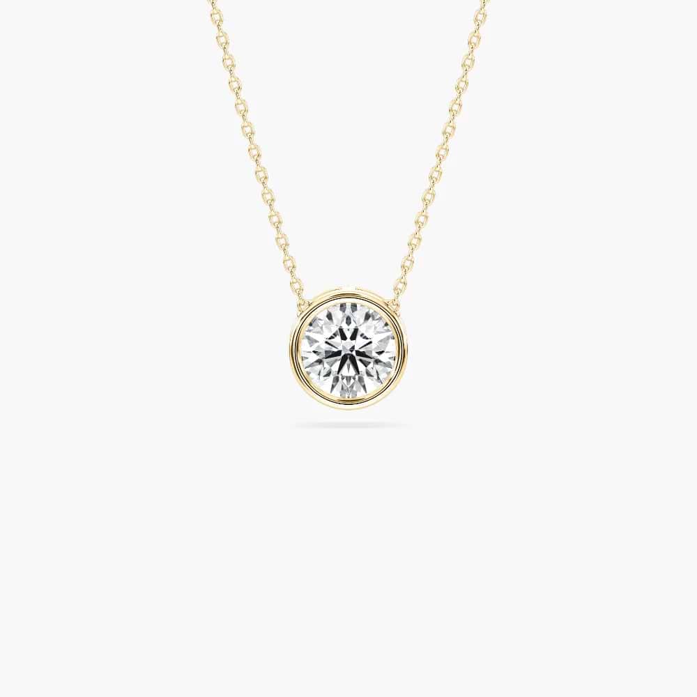 Shown In 14K Yellow Gold|bezel set pendant with a round cut lab grown diamond