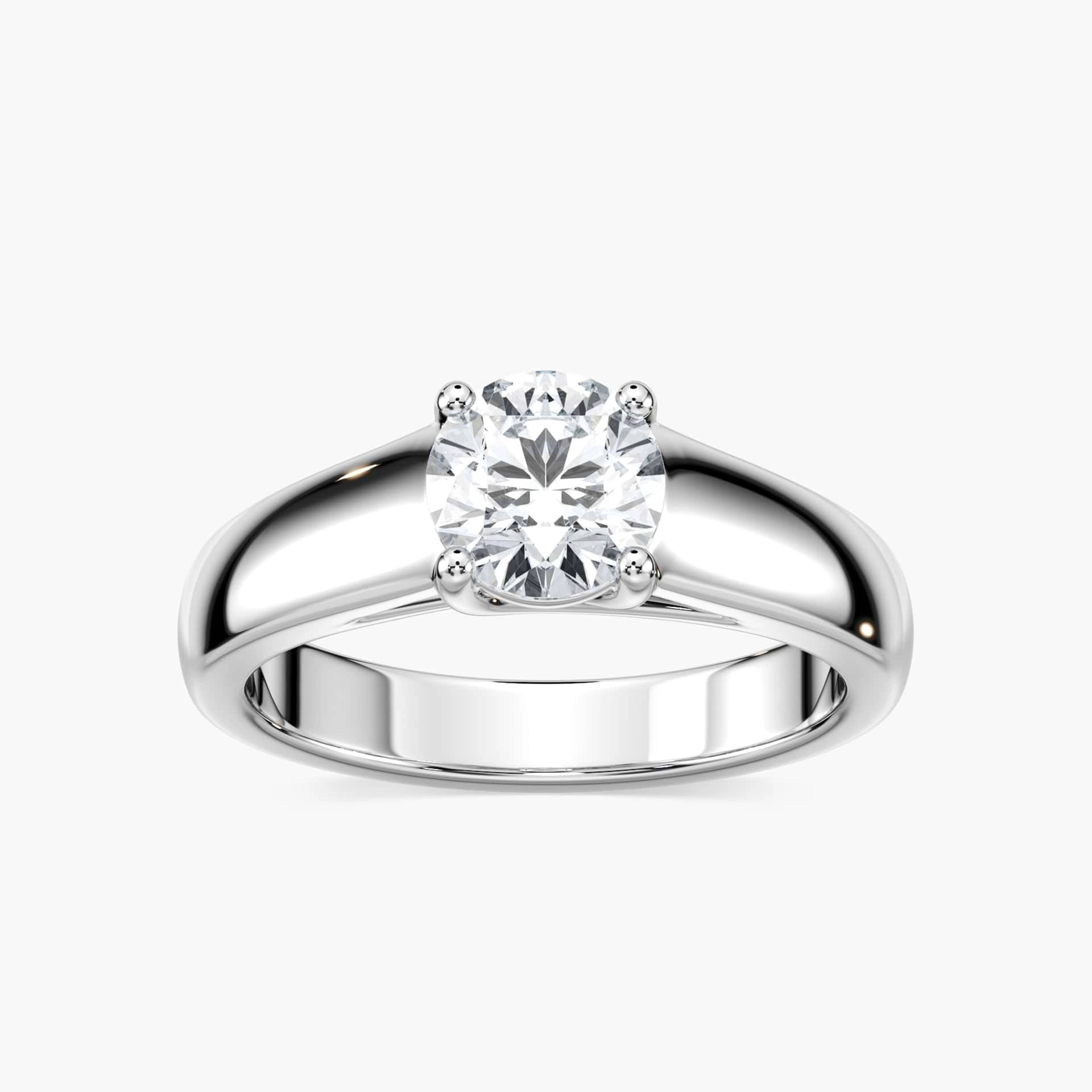 Shown with 1ct Round Cut Lab Grown Diamond in 14k White Gold|Solitaire engagement ring with wide band inspired by tiffany & co lucida engagement ring