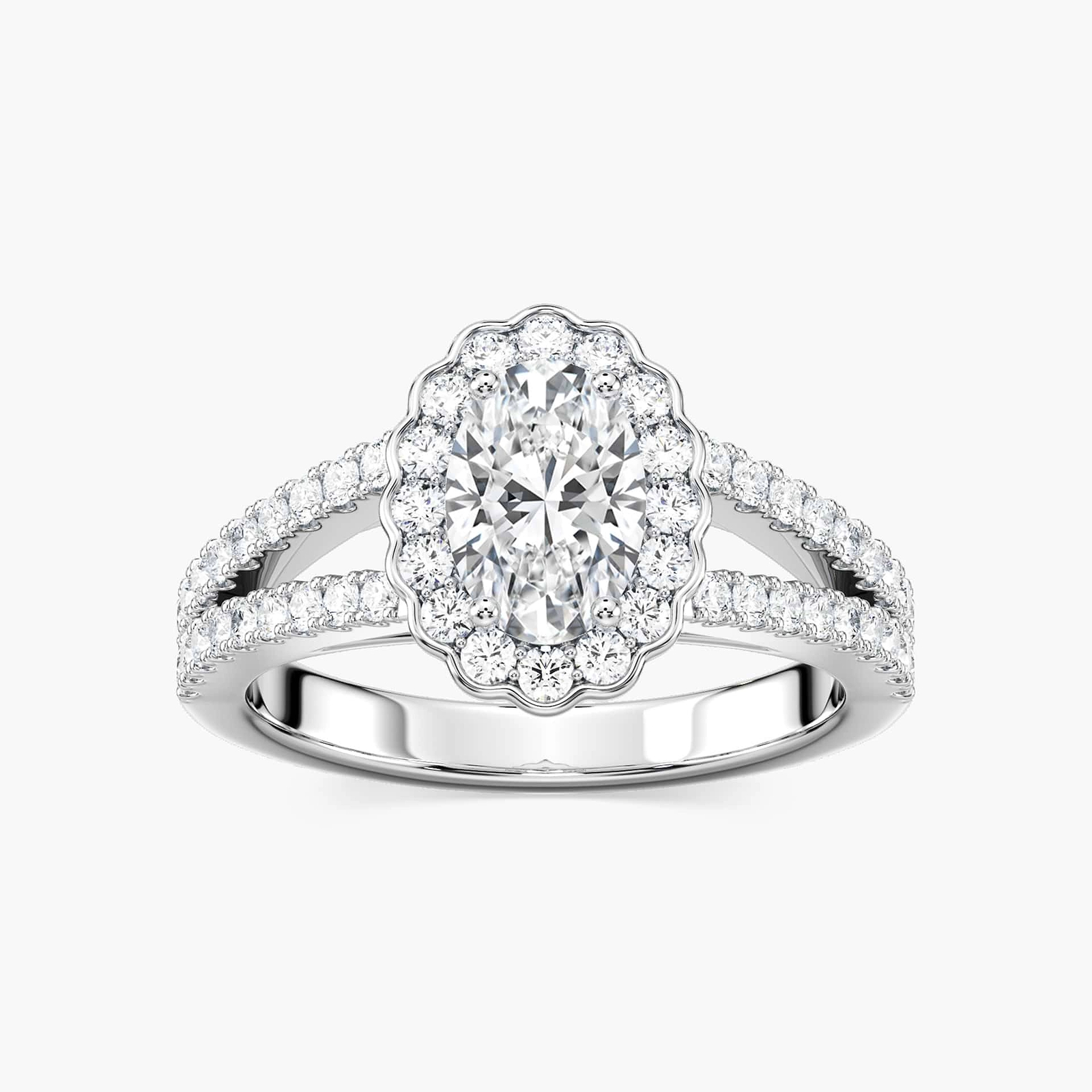 Shown with 1ct Oval Cut Lab Grown Diamond in 14k White Gold|Unique nature inspired flower halo engagement ring with diamond accented split shank holding a 1ct oval cut lab grown diamond in 14k white gold