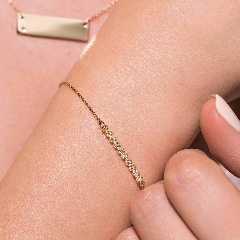 Diamond Bar Bracelet is set with 0.15ctw Lab-Grown Diamonds in a straight bar setting shown in recycled 14k yellow gold |Diamond Bar Bracelet 0.15ctw Lab-Grown Diamonds straight bar setting recycled 14k yellow gold