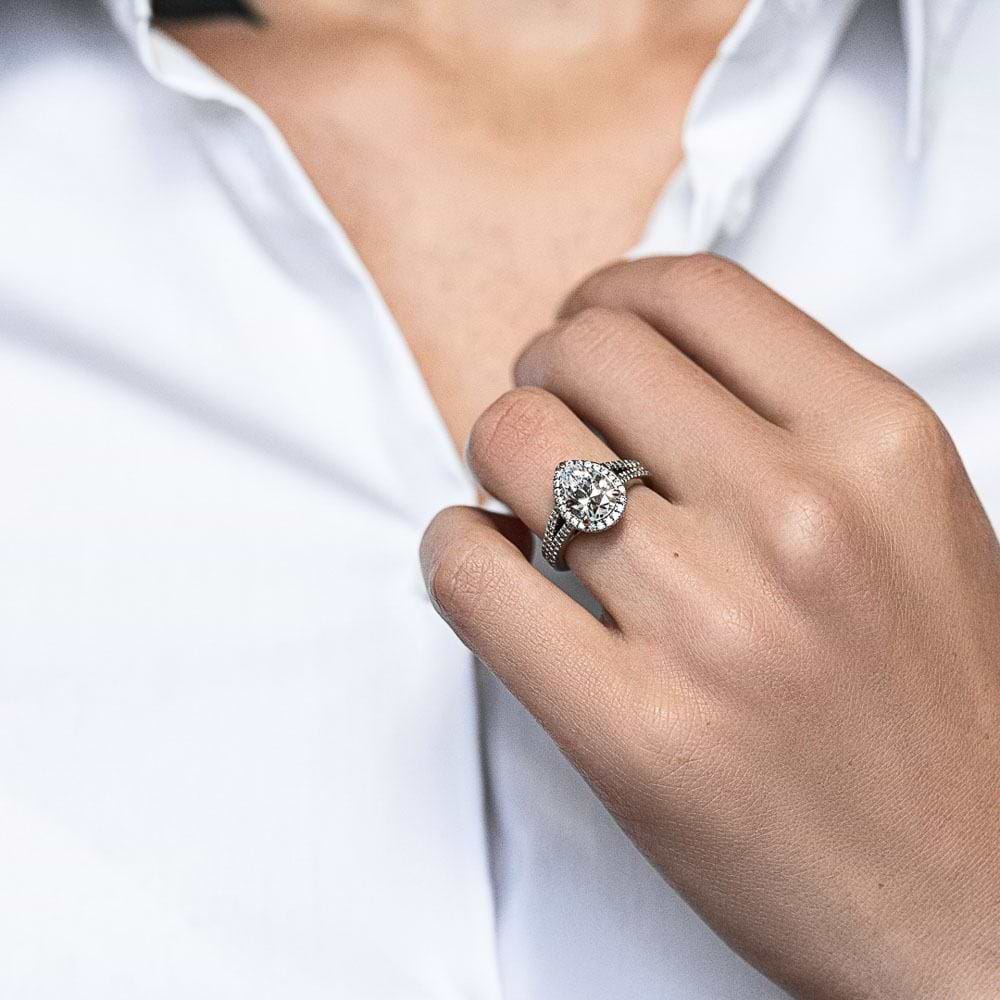 Shown with 2ct Pear Cut Lab Grown Diamond in 14k White Gold|Split Shank Diamond Accented Halo Engagement Ring with 2ct Pear Cut Lab Grown Diamond in 14k Recycled White Gold