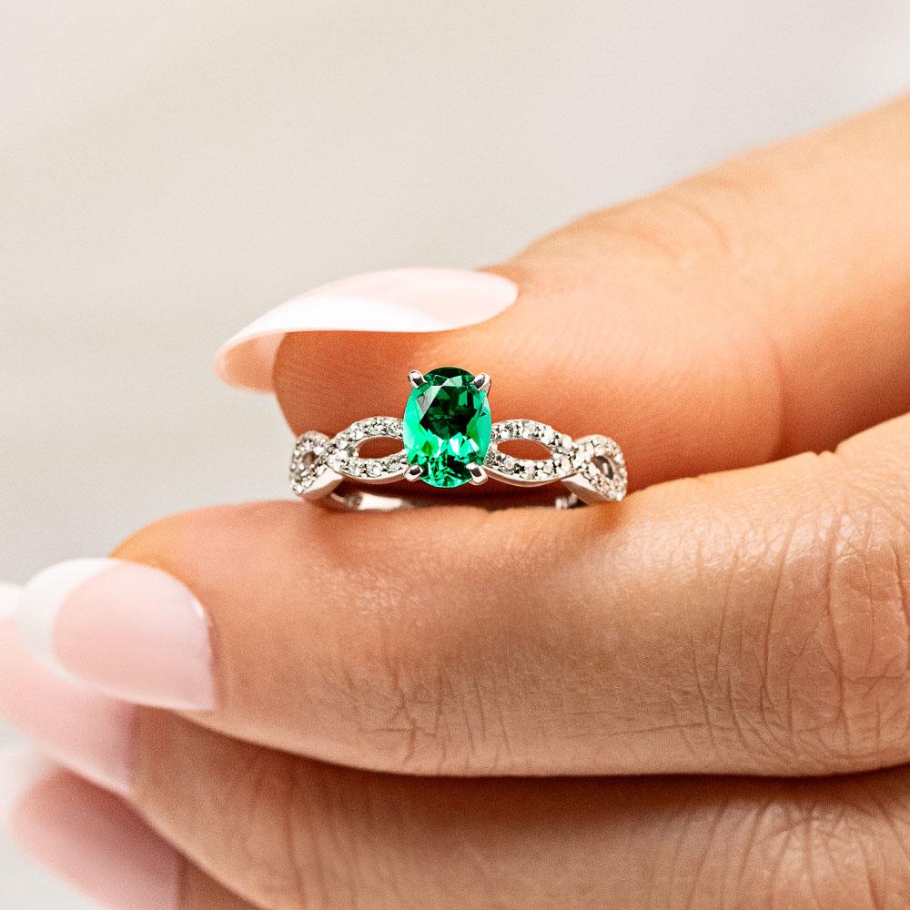 Allure Engagement Ring set with a 0.70ct Lab-Grown Emerald center stone in platinum 