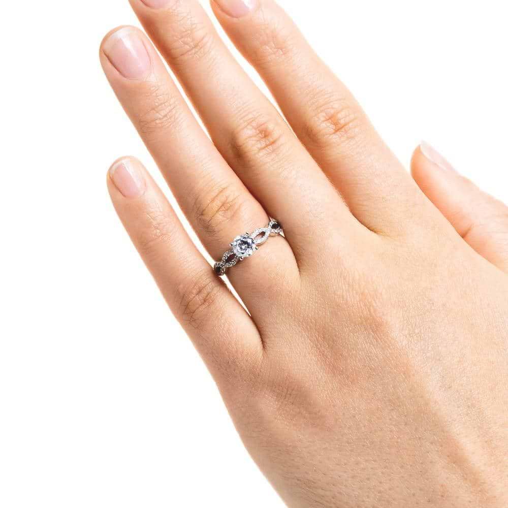 Shown with 1.25ct Round Cut Lab Grown Diamond in 14k White Gold|Diamond accented engagement ring with 1.25ct round cut lab grown diamond in 14k white gold worn on hand