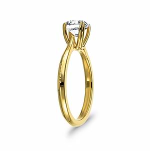 Modern futuristic sci-fi solitaire engagement ring with unique knife edge shank and double prong head holding a 1ct round cut lab created diamond in 14k yellow gold