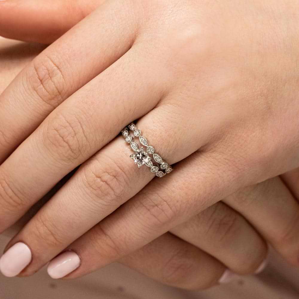 Shown in 14k White Gold|Antique style romantic diamond accented wedding band with milgrain detailing in 14k white gold