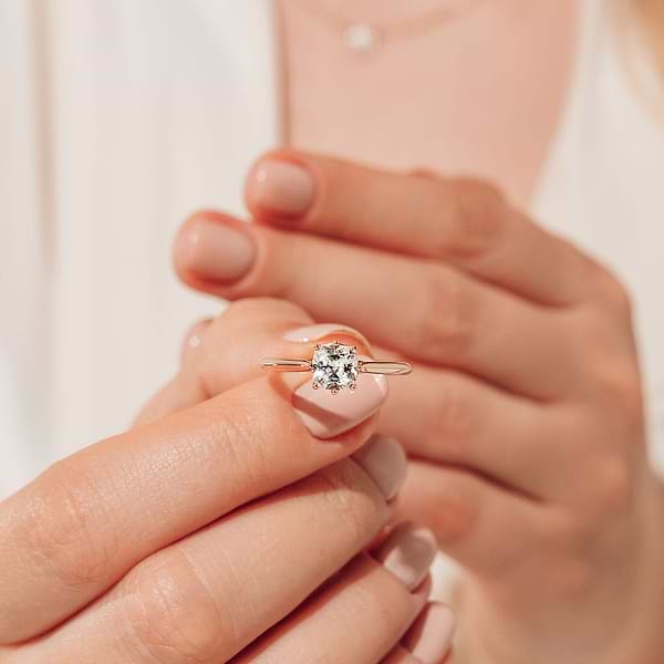 Shown with a 1ct Cushion cut Lab Grown Diamond in 14k Rose Gold|Hidden halo engagement ring with 8 prongs holding a 1ct cushion cut lab grown diamond in 14k rose gold