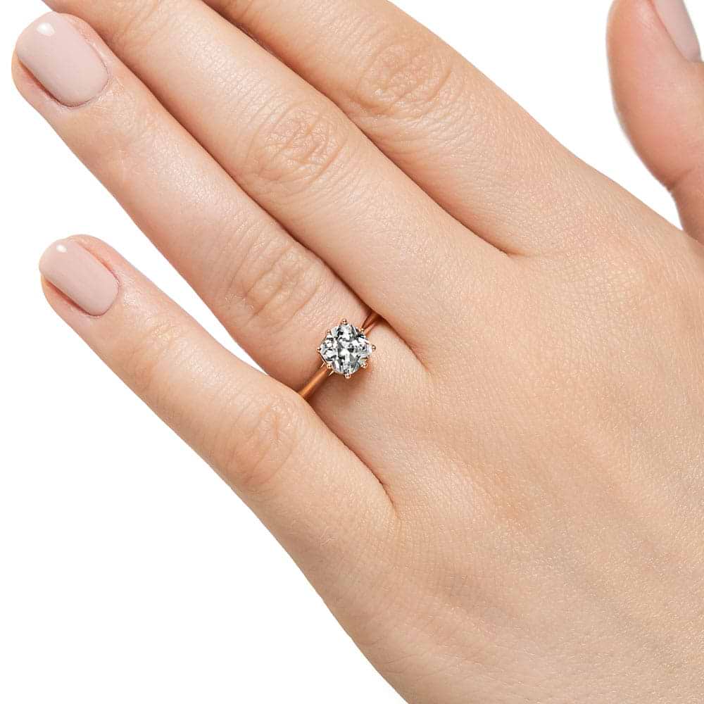Shown with a 1ct Cushion cut Lab Grown Diamond in 14k Rose Gold|Hidden halo engagement ring with 8 prongs holding a 1ct cushion cut lab grown diamond in 14k rose gold
