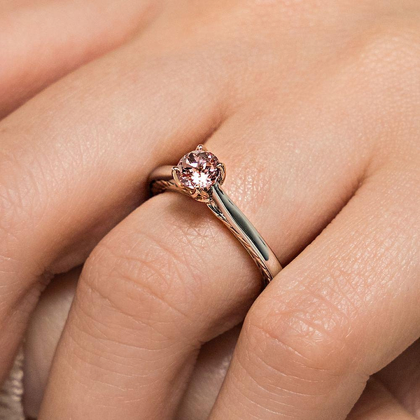Shown with 1ct Lab Created Champagne Pink Sapphire in 14k White Gold|Lab grown champagne pink sapphire engagement ring with two tone 14k white gold and rose gold worn on hand