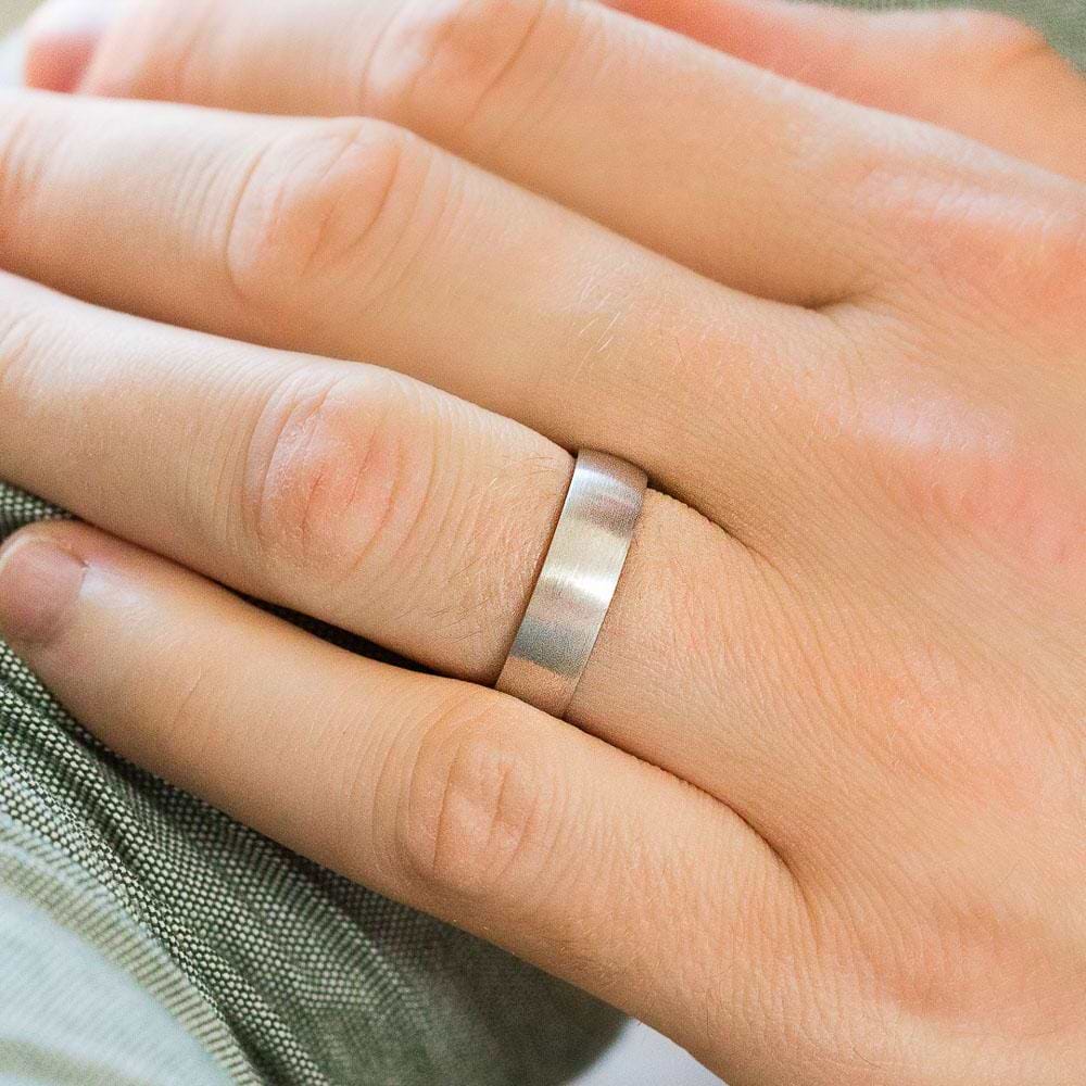 Canyon Men’s Wedding Band shown here in a polished finish in recycled 14K white gold. | Canyon recycled white gold men's wedding ring.