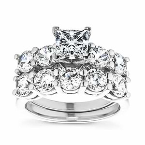  matching wedding set Shown with a 1.0ct Princess cut Lab-Grown Diamond center stone with 1.0ctw Diamond Hybrid side stones in recycled 14K white gold with matching wedding band