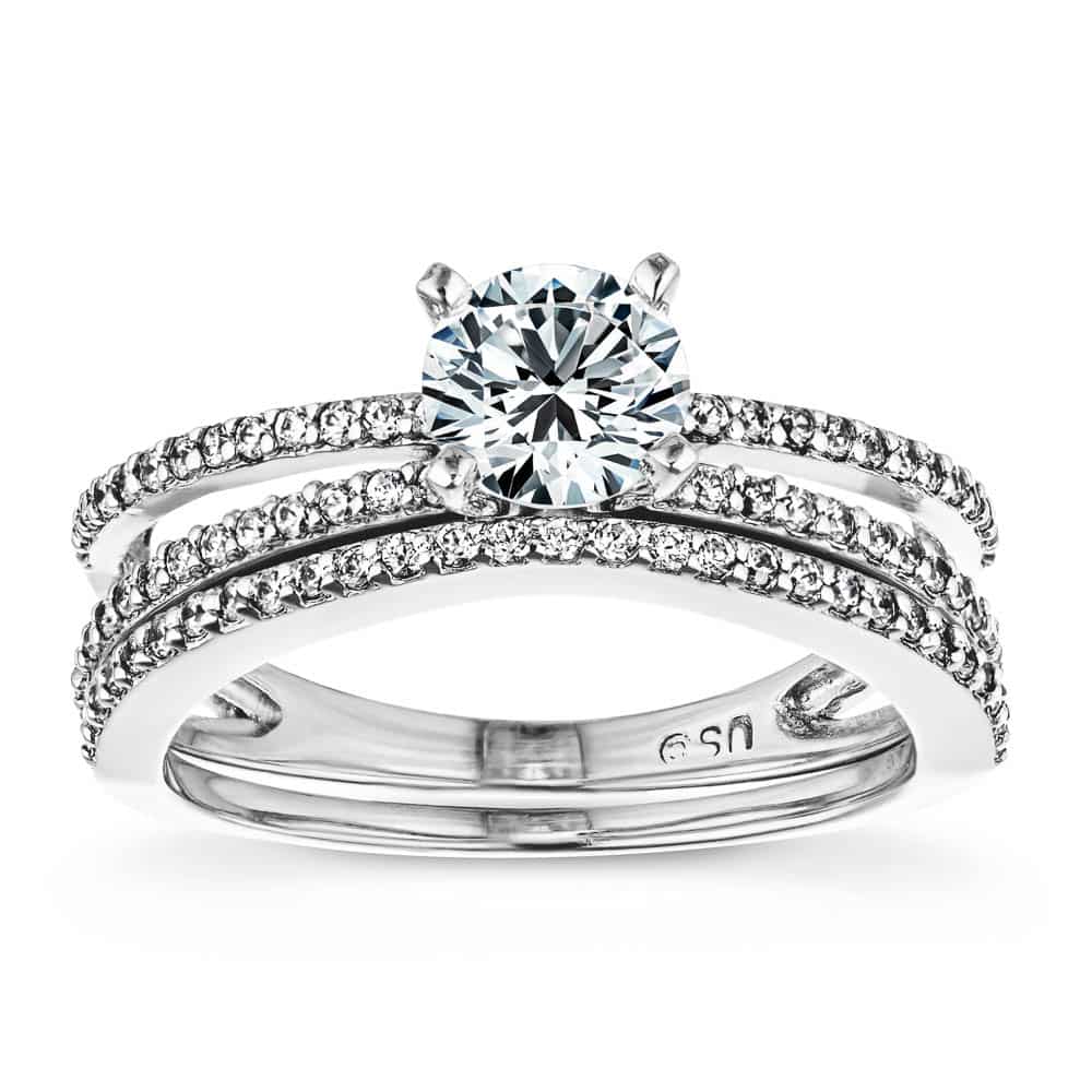 Shown with a 1.0ct Round cut Lab-Grown Diamond with a diamond accented split shank in recycled 14K white gold with matching wedding band