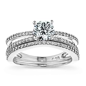  diamond accented engagement ring Shown with a 1.0ct Round cut Lab-Grown Diamond with a diamond accented split shank in recycled 14K white gold with matching band