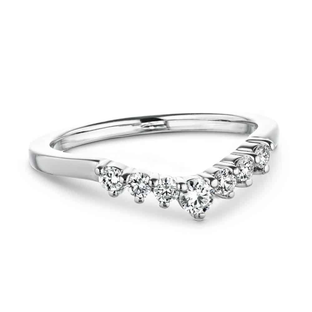 The Cordelia Wedding Band has a .21ctw half halo of round cut recycled diamonds that get larger in size as they meet in the middle of the recycled 14K white gold band | Cordelia wedding band recycled diamonds 14K white gold