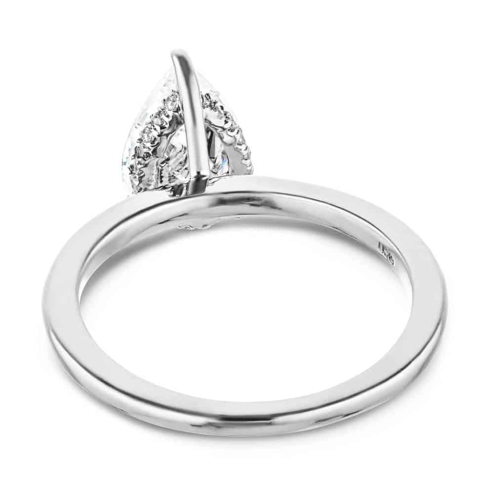 Shown with a 1.0ct Pear cut Lab-Grown Diamond with a hidden halo in recycled 14K white gold 