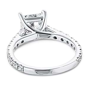 Diamond accented engagement ring with 1ct cushion cut lab grown diamond set in a four prong trellis in platinum shown from back