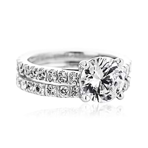 Diamond accented lab grown diamond wedding ring set in 14k white gold