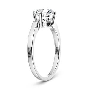 Modern simple minimalistic solitaire engagement ring with 1ct round cut lab grown diamond in 14k white gold shown from side