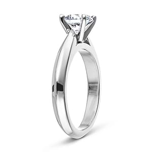 Simple solitaire engagement ring with cathedral design holding a 1ct round cut lab grown diamond in 14k white gold shown from side