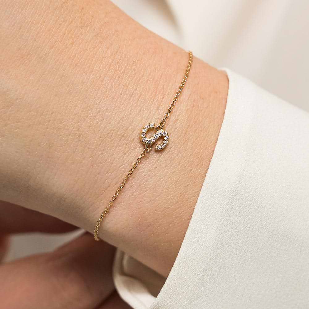 Diamond Initial Bracelet shown with "M" in 14K yellow gold | initial bracelet in gold with diamond accented letter