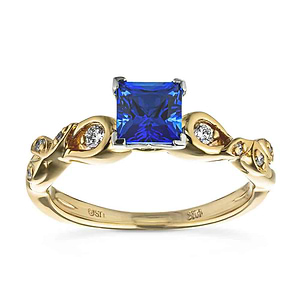 Beautiful nature inspired design engagement ring with diamond accented band and a 1ct princess cut lab created blue sapphire in 14k yellow gold