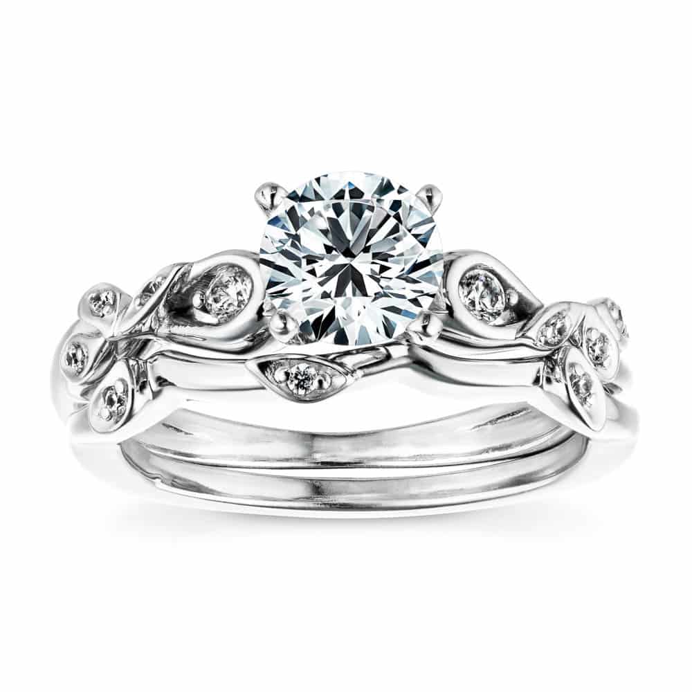 Shown with a 1.0ct Round cut Lab-Grown Diamond with accenting diamonds in recycled 14K white gold with matching wedding band 