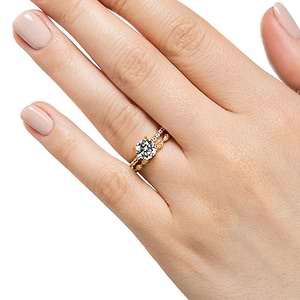 Diamond accented vintage style wedding ring set featuring 14k yellow gold engagement ring with 1ct round cut lab created diamond