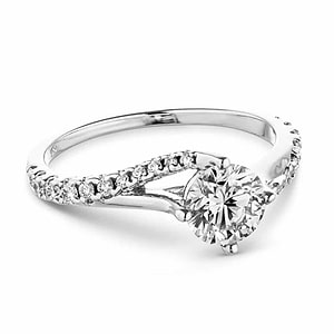 Modern engagement ring with twisted diamond accented band set with 1ct round cut lab grown diamond in 14k white gold